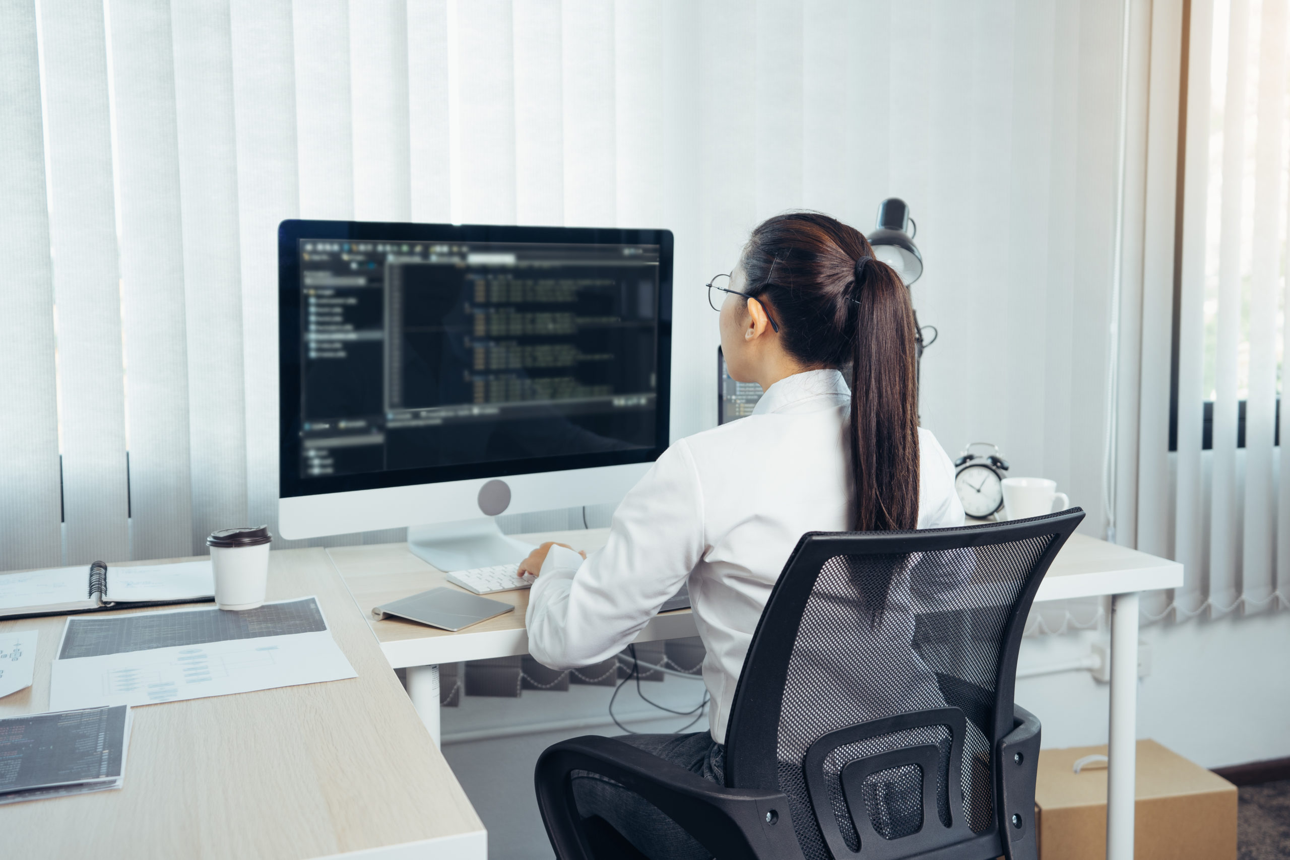 Asian woman professional development programming website working