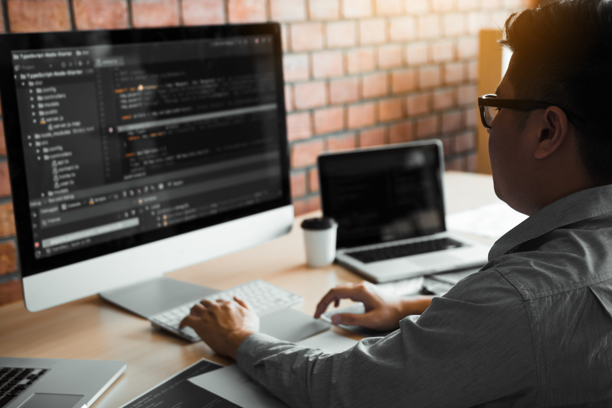 Asian man working code program developer computer web developmen
