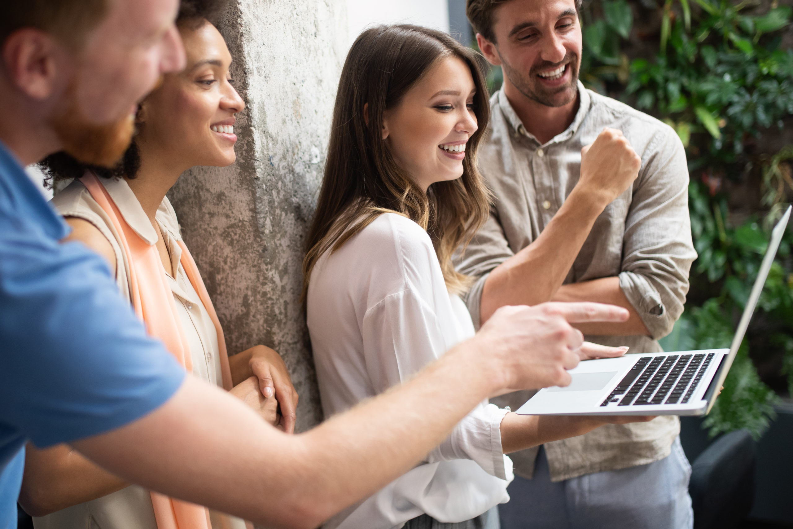 Programmers cooperating at IT company developing apps