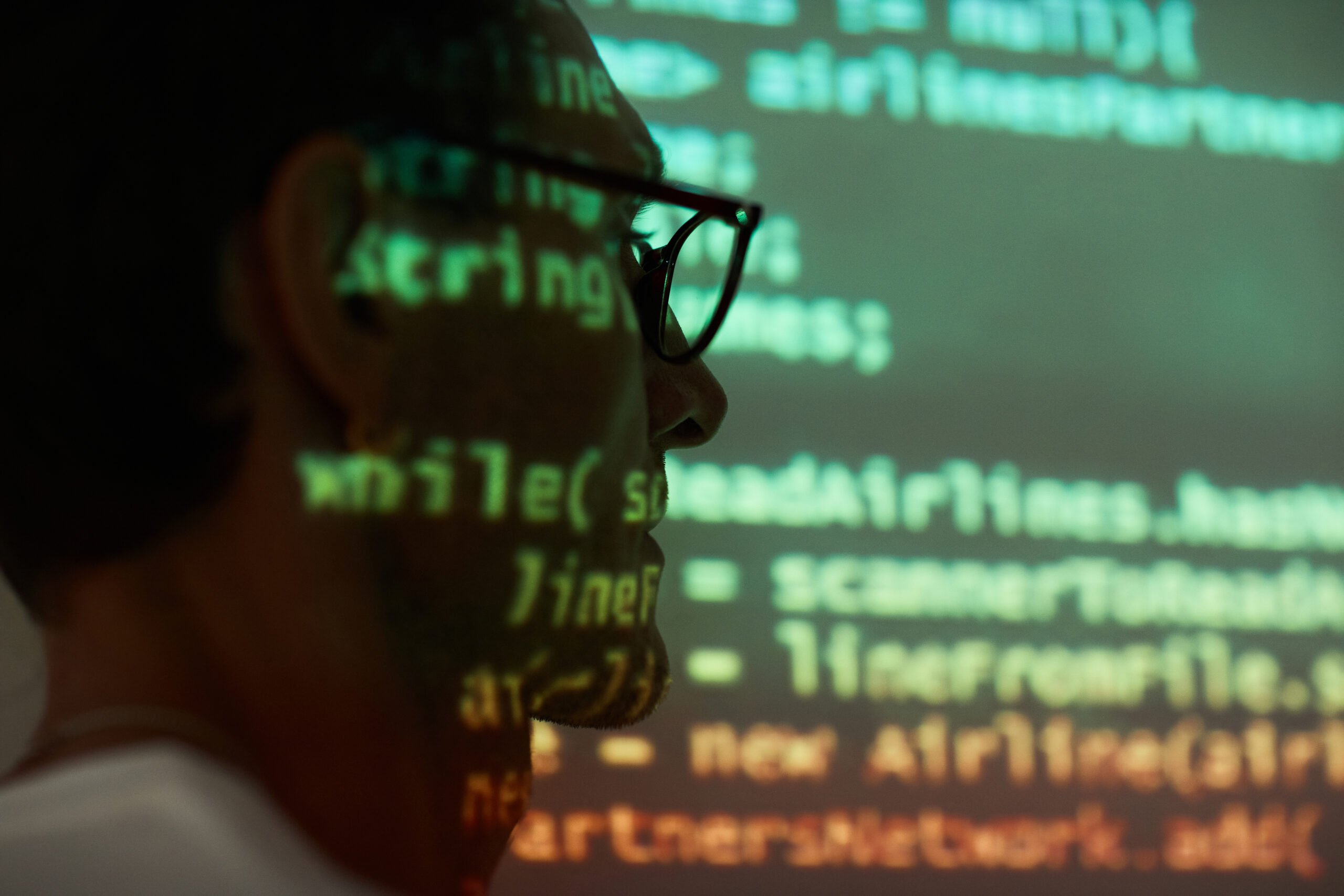 Programmer at computer presentation